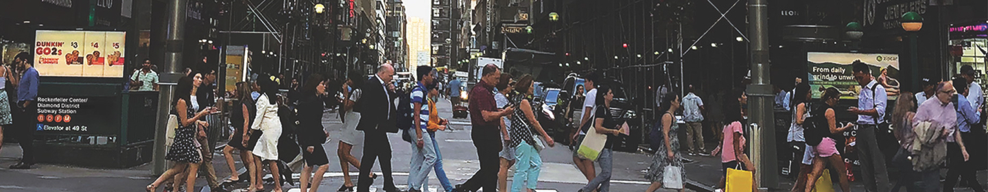 Pedestrians crossing 47th Street by the Diamond District entrance